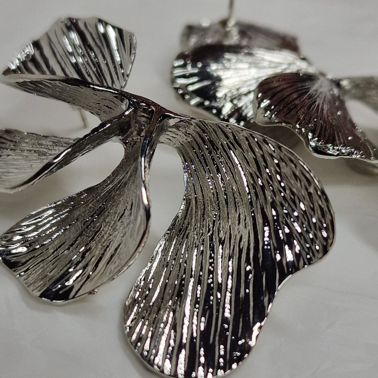 Oversized Silver Floral Statement Earrings – Sculptural Metal Flower Earrings, Bold Fashion Jewelry, Designer Style Earrings